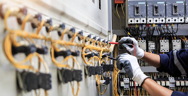 Professional Electrician technician working in Islandia, NY